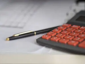 Attorney calculating truck accident settlement in Sacramento, CA