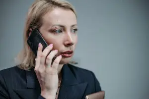 Injured woman calling after truck accident in Sacramento, CA