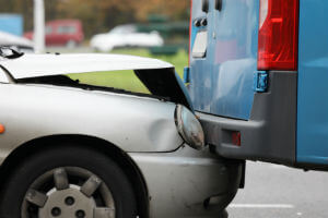 blue-van-hit-from-behind-grey-car