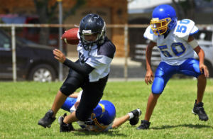 kids playing football