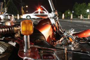 motorcycle on its side in the road