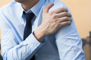 man with shoulder injury