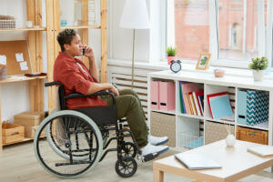 woman-in-wheel-chair-on-phone