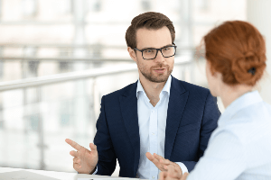 man and woman having a conversation