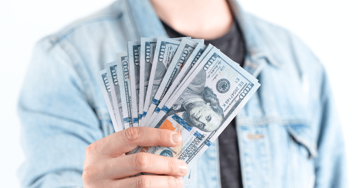 man offering cash