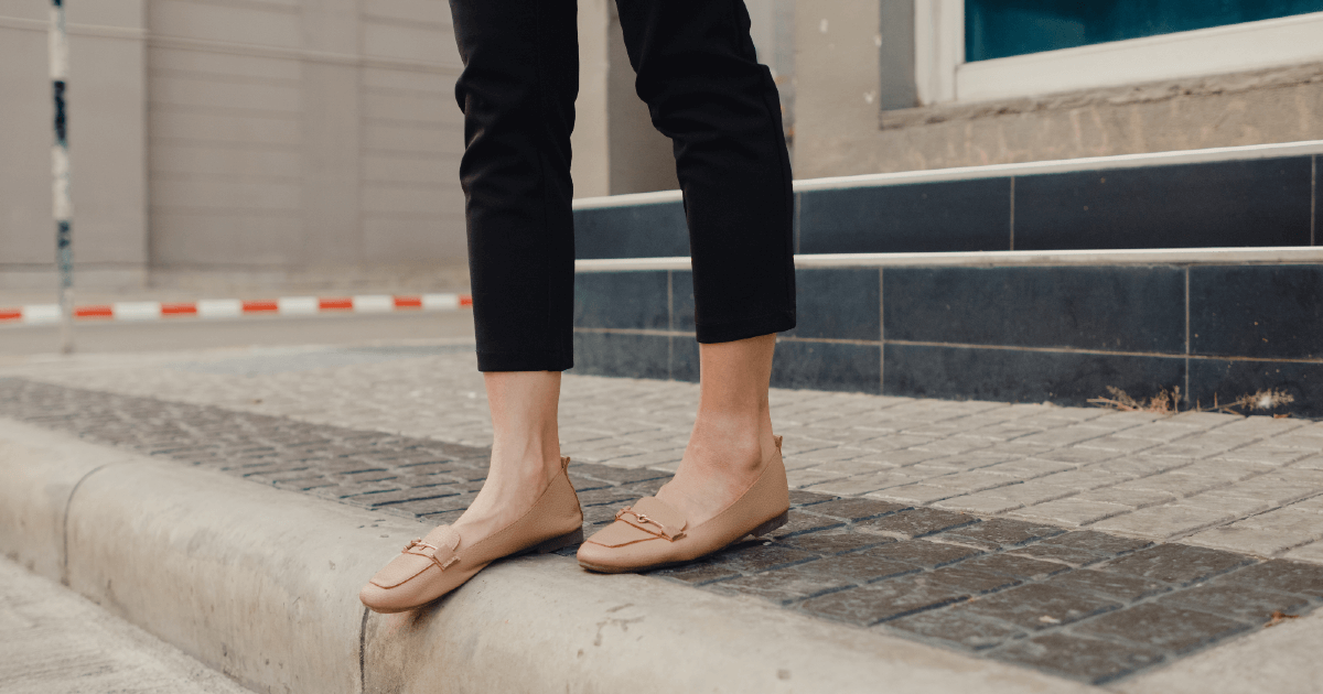 woman about to jaywalk