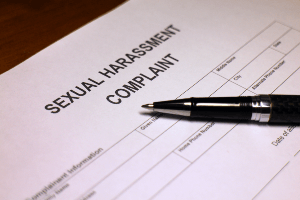 Sexual harassment document on a table. 