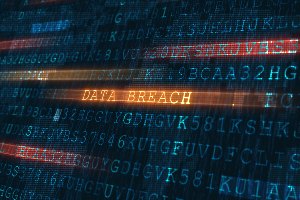 data breach in orange letters in code