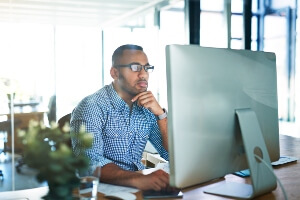 stock image of a young black male IT professional