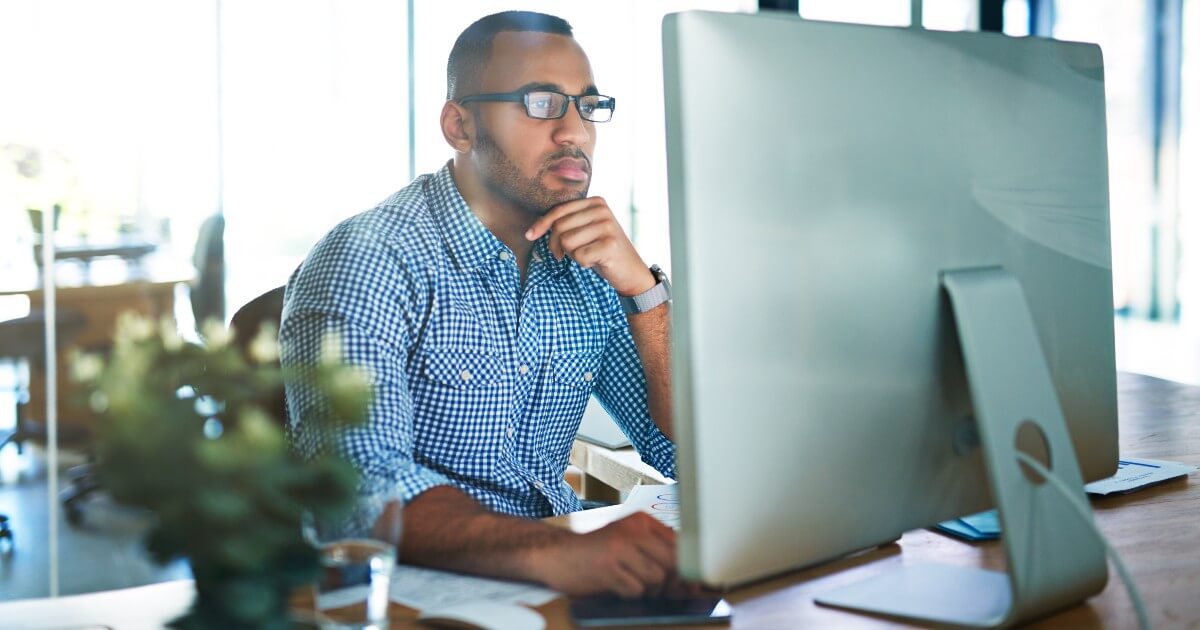 stock image of a young black male IT professional