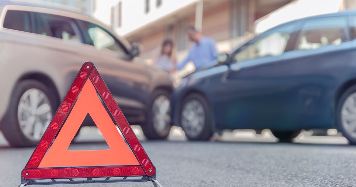 photo illustration of a car accident in the distance