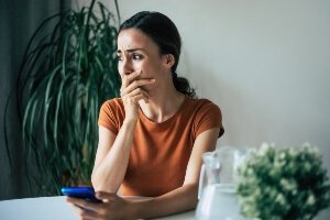 upset woman waited too late to call an attorney