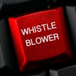 red whistleblower key on keyboard