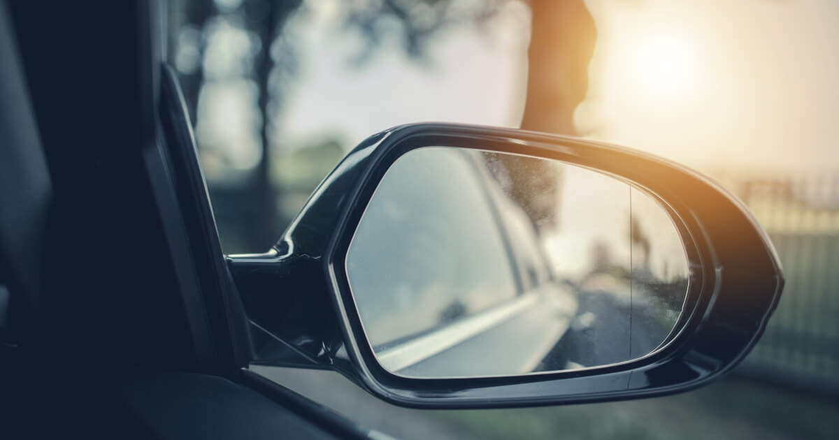 Close up of a vehicles side-view mirror