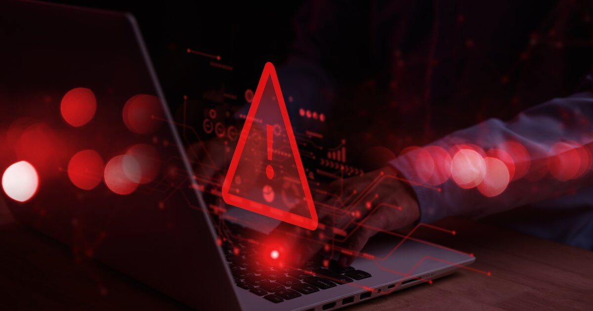 laptop with warning icon