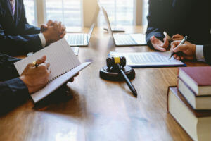 mediation-meeting-books-laptops