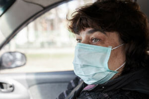 woman-wearing-mask-in-car